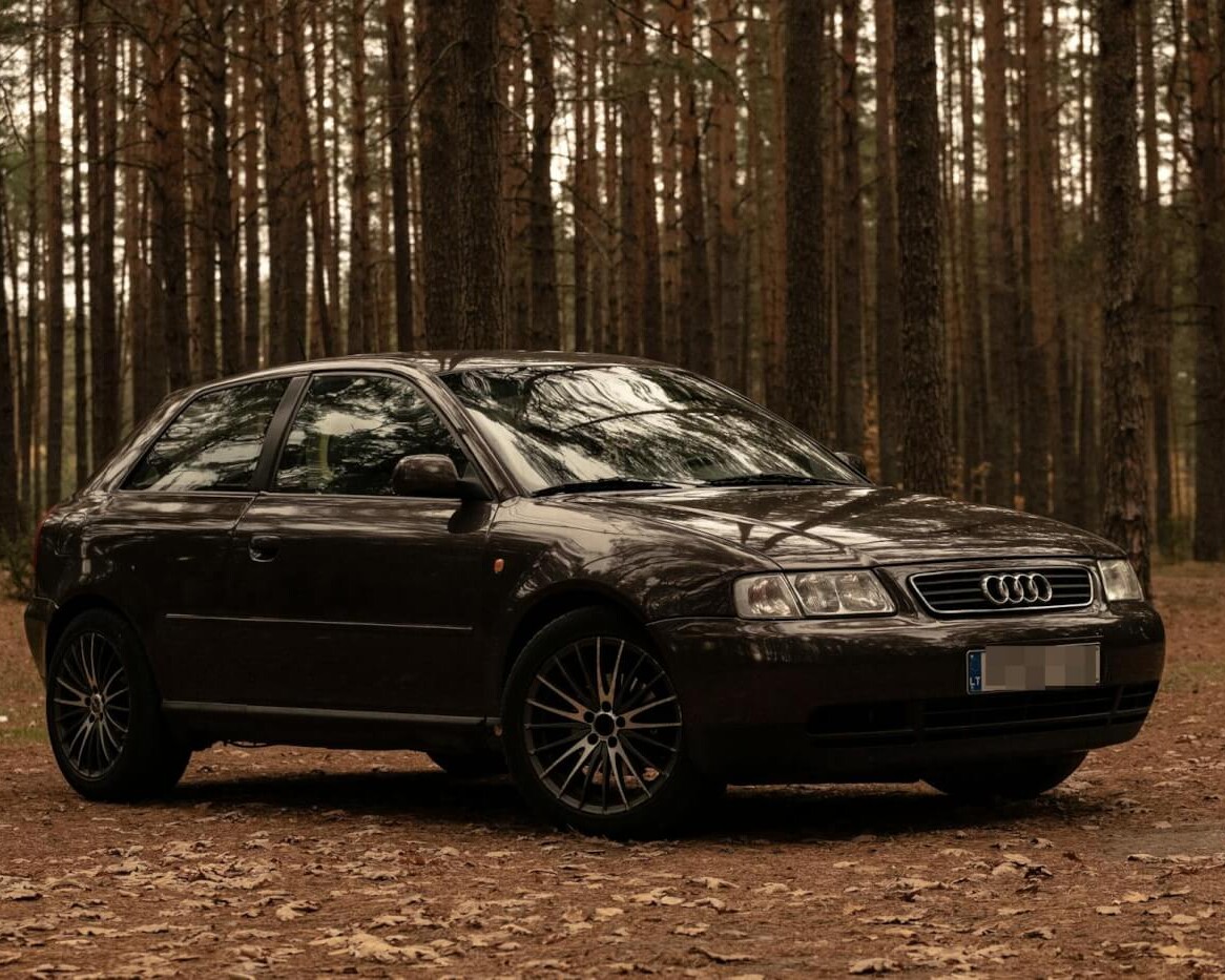 photo of audi parked on dirt road