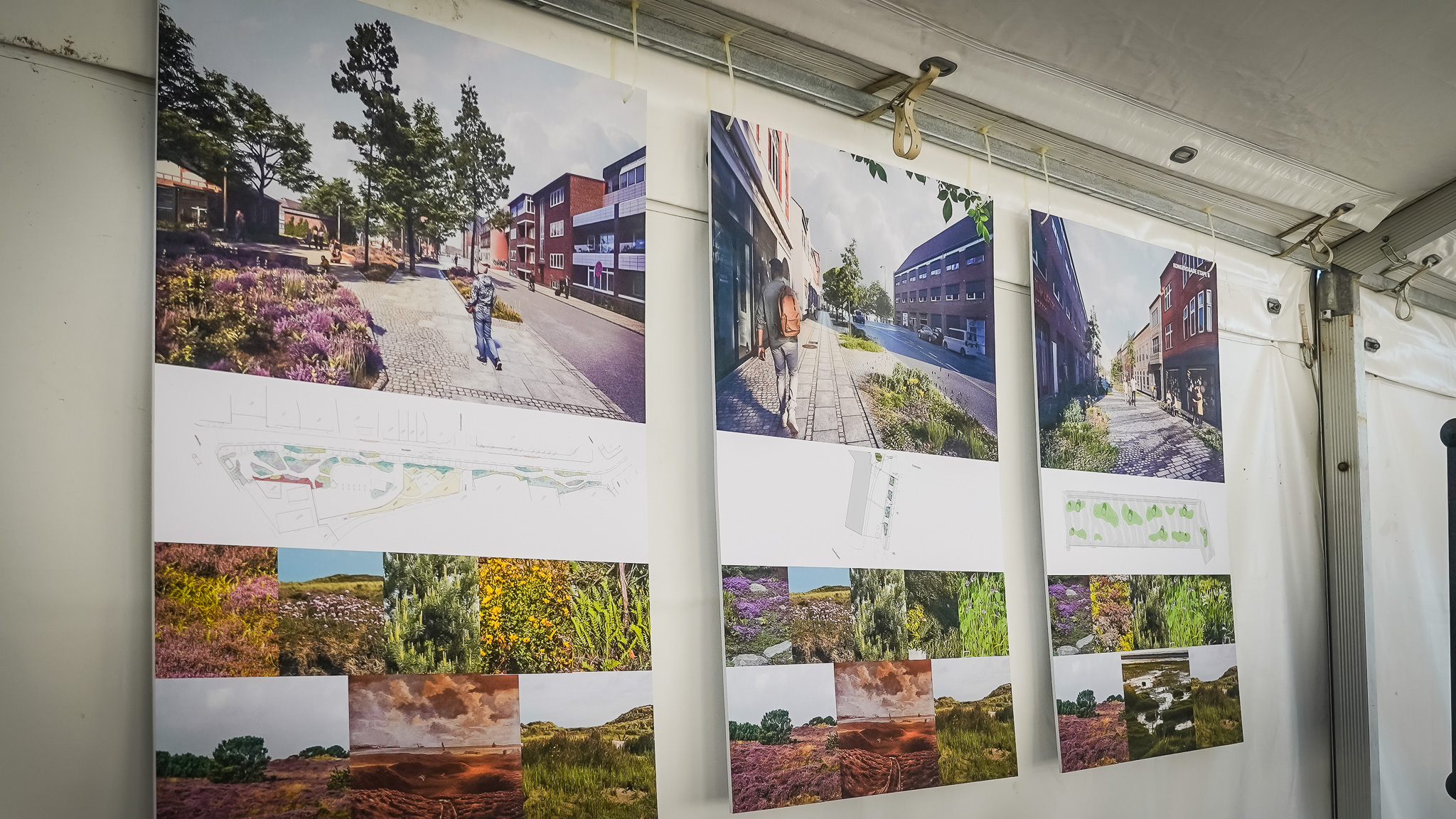 I det opstillede telt på parkeringspladsen i Havnegade var ophængt plancher, der fortalte om de tre projekter. Foto: Fjodor Pedersen.